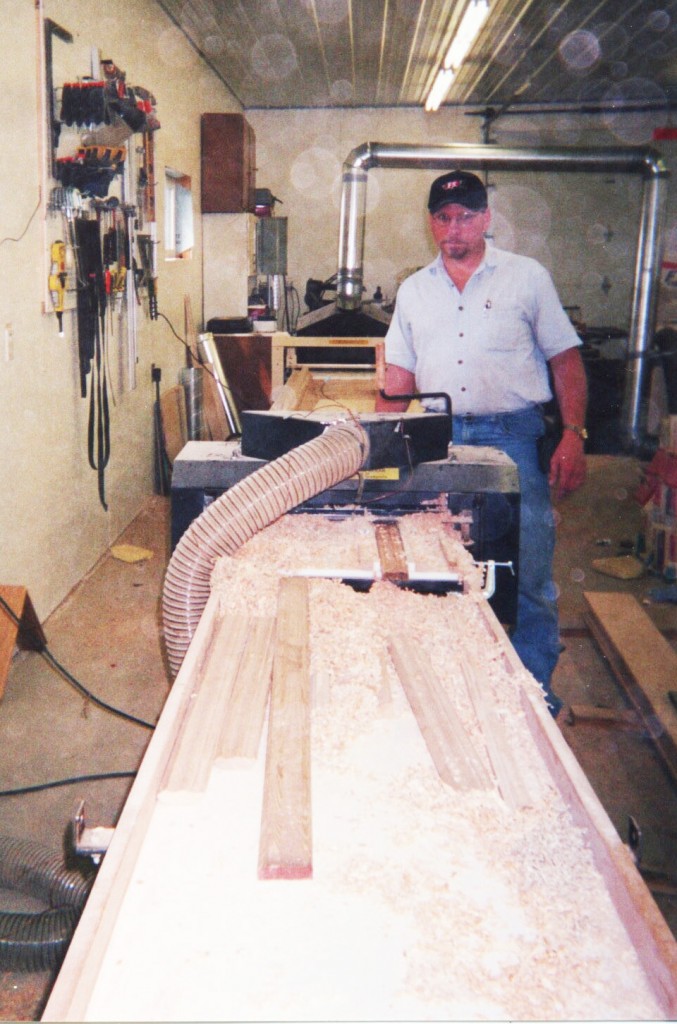 Here's Tim's molding production line. The hood's off the Woodmaster Molder/Planer as he makes some fine adjustments.