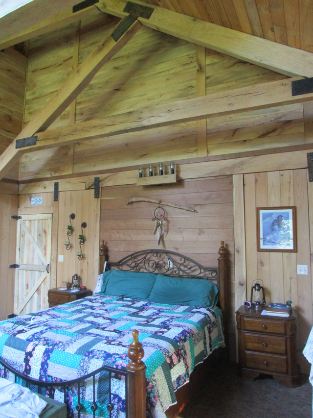 Tom's master bedroom made of walnut, oak, and pecan woods.