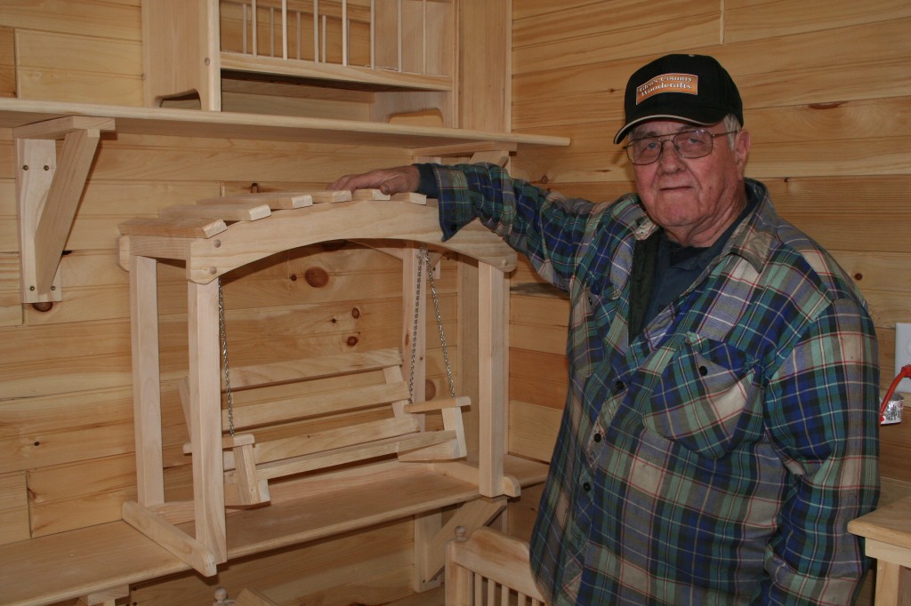 Glen builds all kinds of wood products with his Woodmasters. Here he displays doll furniture he builds to accompany the popular American Girl Doll.