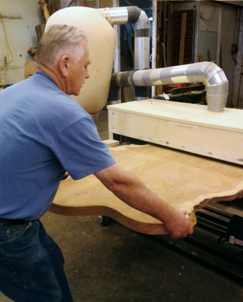 Logger-turned-woodworker, Mark Abernathy, turns a single slab of wood into a handsome, rustic tabletop with his 50″ Woodmaster Drum Sander.