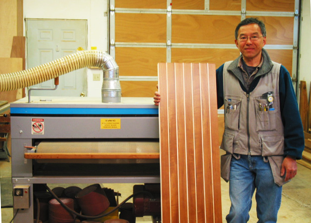 Here's Glen Taniguchi with his Woodmaster Drum Sander and an example of some of the work he does as he's building and restoring high-end boats in his Washington state shop. "I couldn't do the work I do without the Woodmaster," he says. "It gives me an edge over my competition."