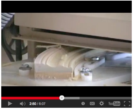 Gary's curved molding emerges from the Woodmaster ready for finishing. 